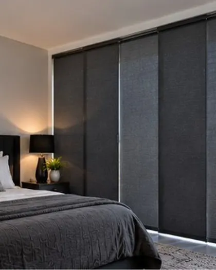 Charcoal panel glides in a bedroom
