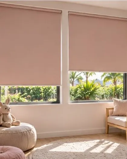 Blush roller blinds in a child bedroom