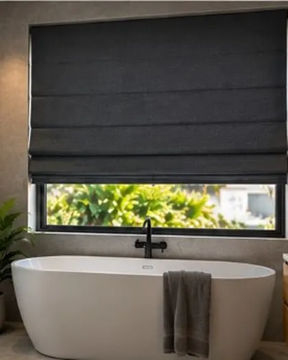 Charcoal Roman blinds in a bathroom