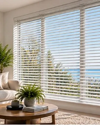 White Venetian blinds in a coastal living room