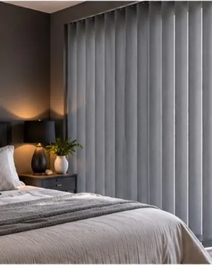 Grey vertical blinds in a bedroom